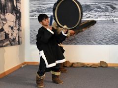 04C A Young Boy Demonstrates Traditional Inuit Drum Dancing In Pond Inlet Mittimatalik Baffin Island Nunavut Canada For Floe Edge Adventure